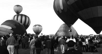 Hot air balloons being filled at an event.