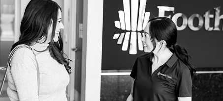 Employee talking with a customer.